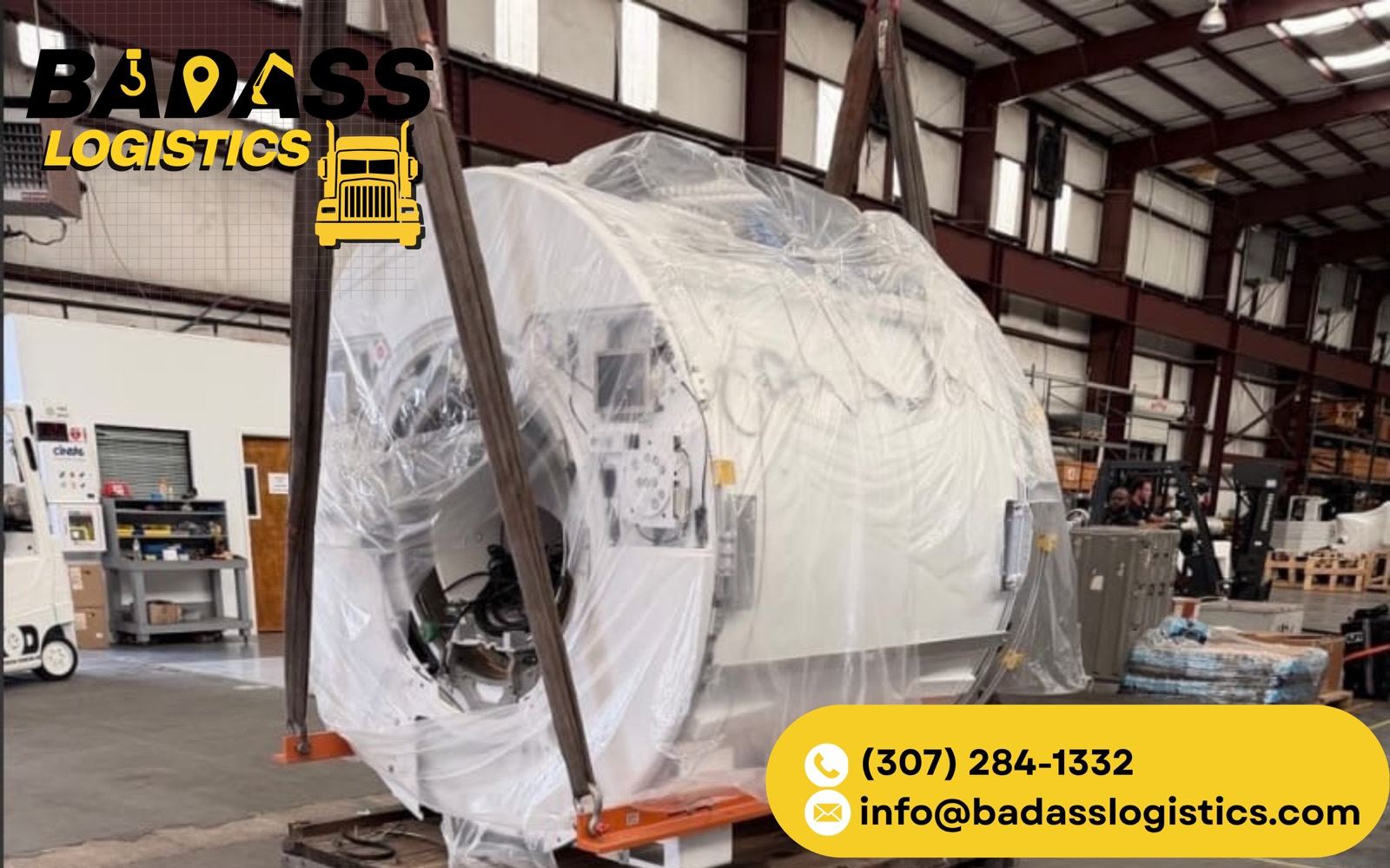 MRI scanner rigged and lifted inside a warehouse by Badass Logistics riggers
